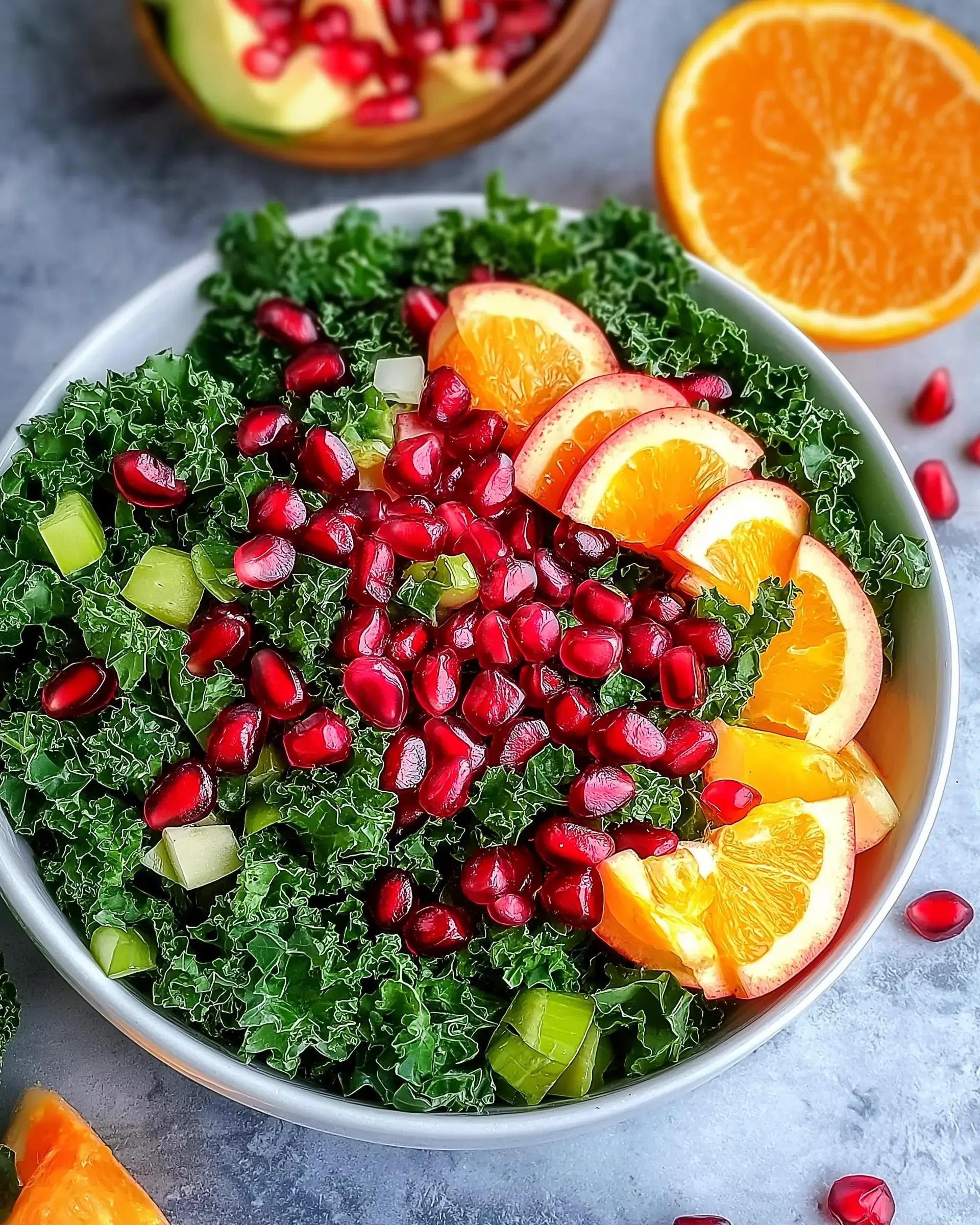Kale salad with pomegranate seeds delights your taste buds!